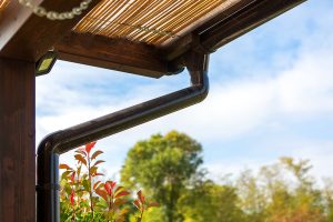 Fa teraszfedés, egyedi teraszfedés, terasz, ragasztott fa terasz, polikarbonát tető, Deluxe Building, félköríves csatorna