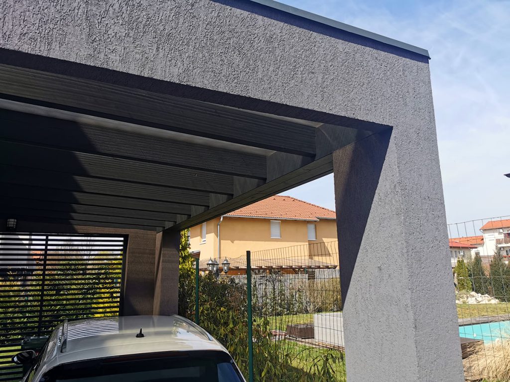 Kocsibeálló ötletek, fedett kocsibeálló, dupla kocsibeálló, egyedi kocsibeálló, autóbeálló, vakolt, terméskő borítás, fa szerkezetes beálló, Deluxe Building